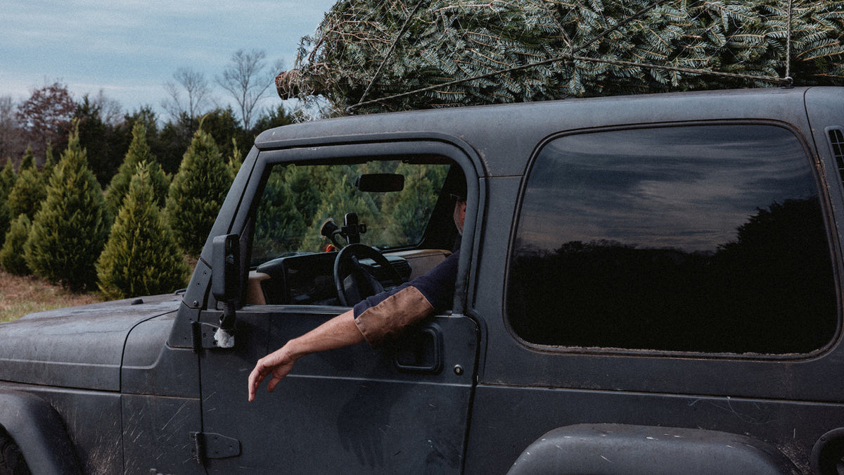 Billy in his Jeep.