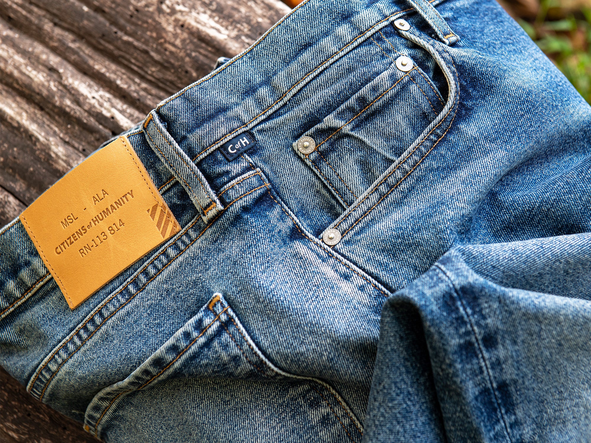 Citizens of Humanity x Billy Reid Jeans, focused on the leather tab at the back.