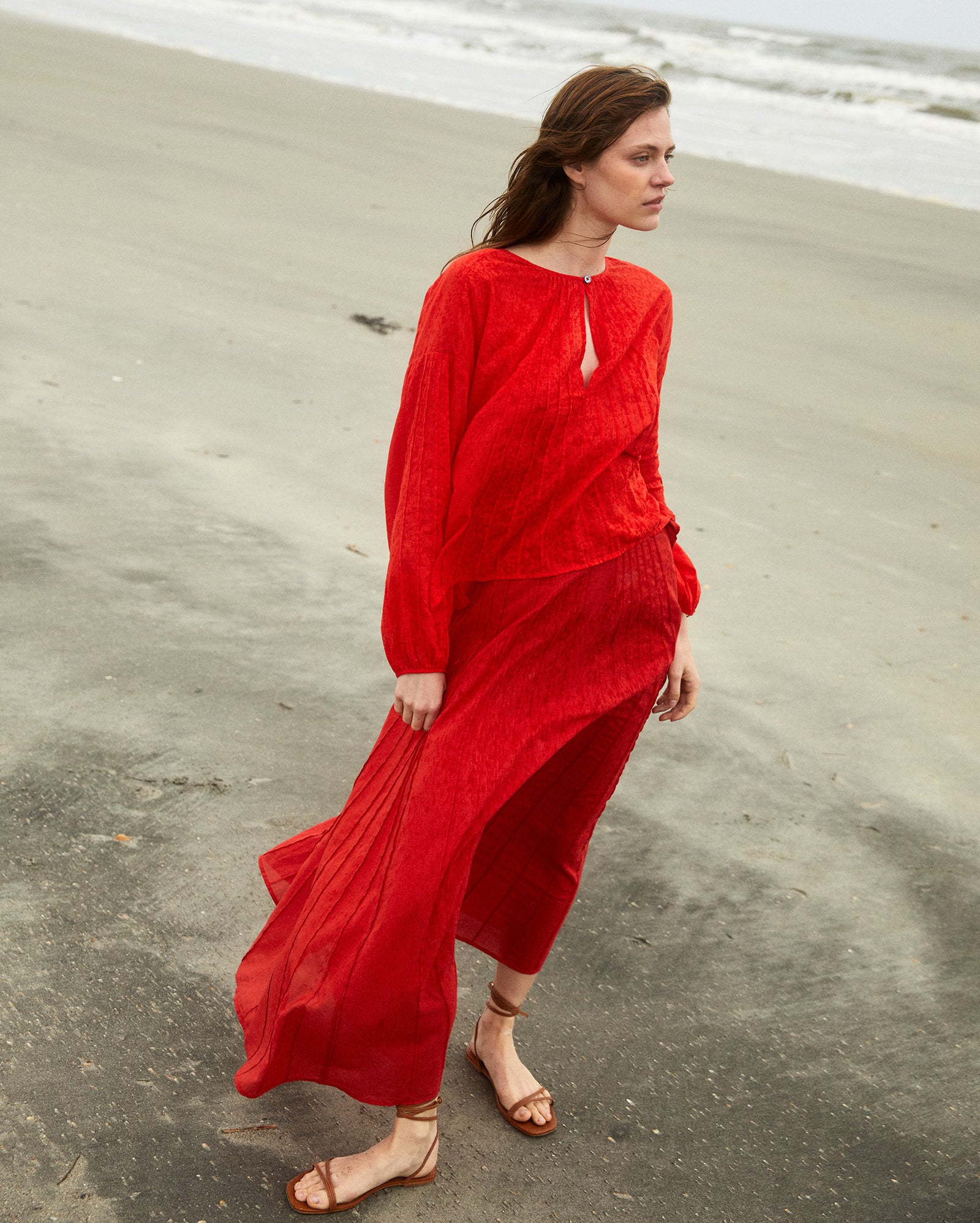 Model wears the Sunray Pintuck Skirt with matching Sunray Blouse.