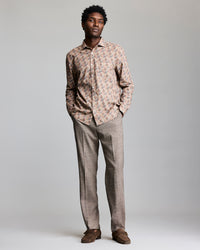 Model shows. the fit of the shirt