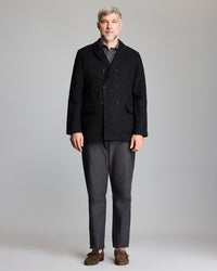 Model shows the fit of the peacoat.