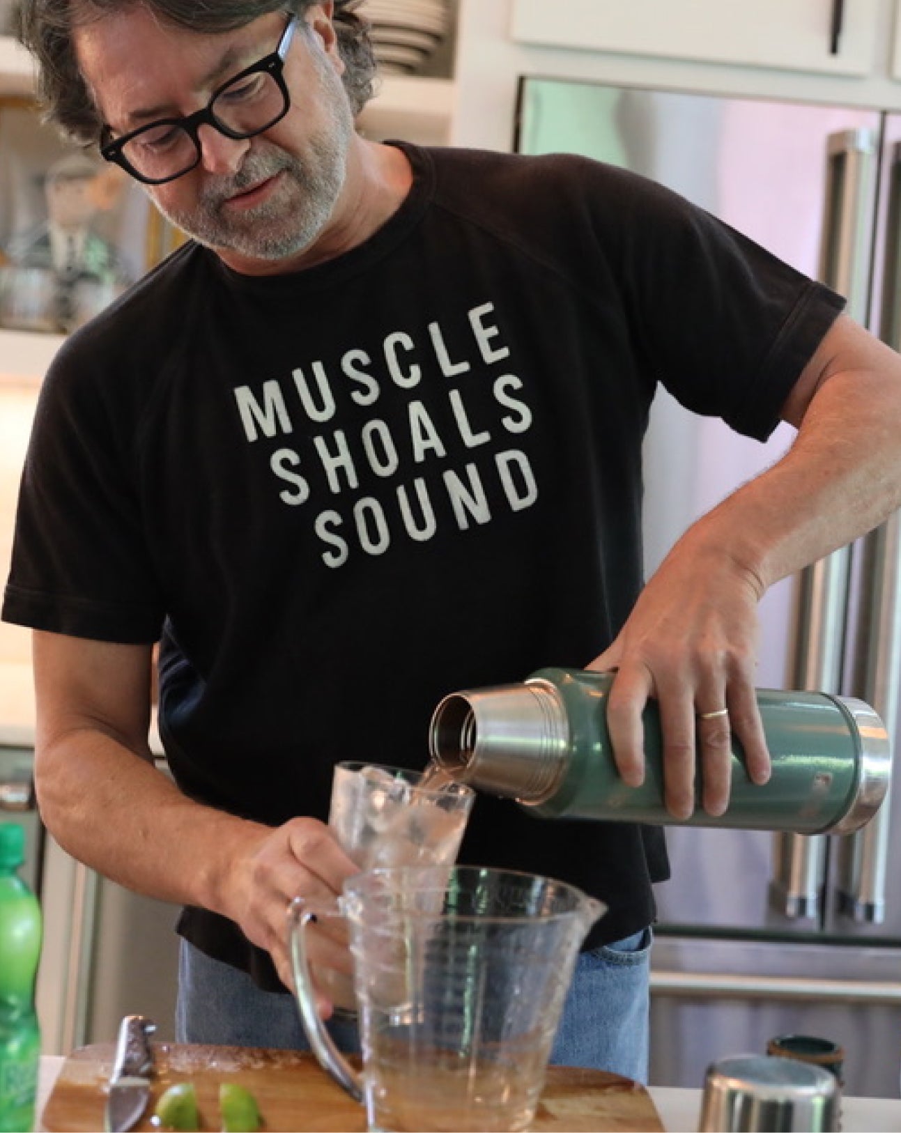 Billy mixes a drink