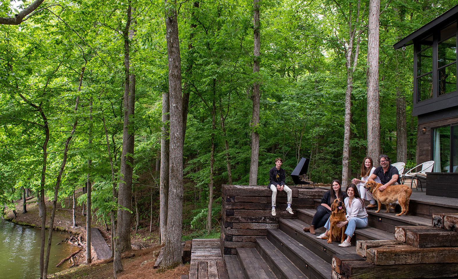 Billy and his family at their lakeside cabin.