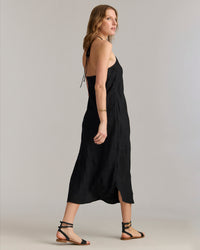 Back view of the dress shows off the low-back cut.