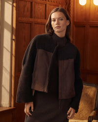 Female model wears the Short Shearling Jacket in Coffee Bean