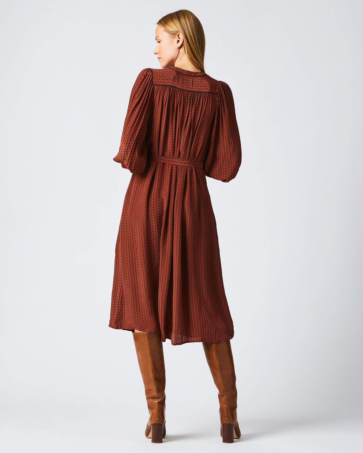 Female model wears the Tea Dress in Wine/Chocolate