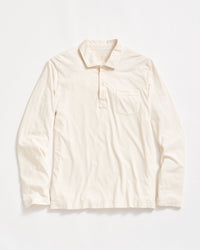 A long-sleeve, off-white collared shirt with a front pocket on the left chest and a partial button placket, laid flat on a white background.
