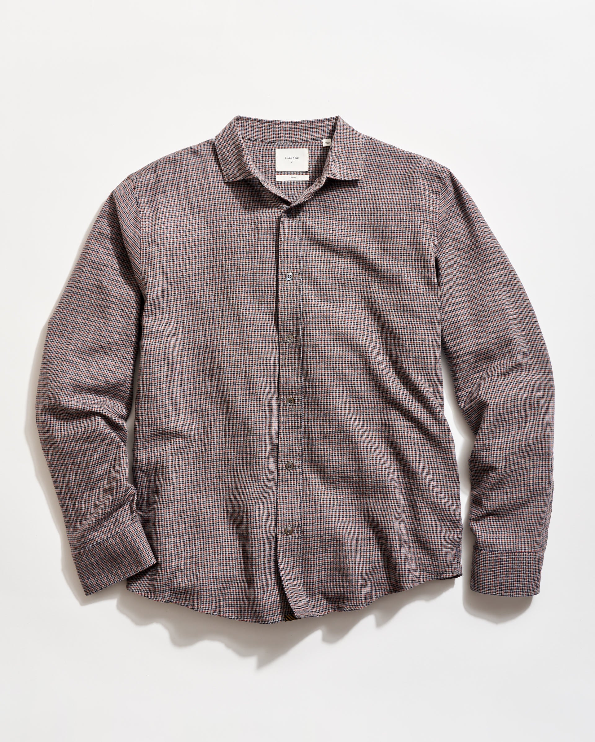 Plaid shirt on a light gray background