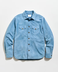 Light blue denim shirt with button details on a white background