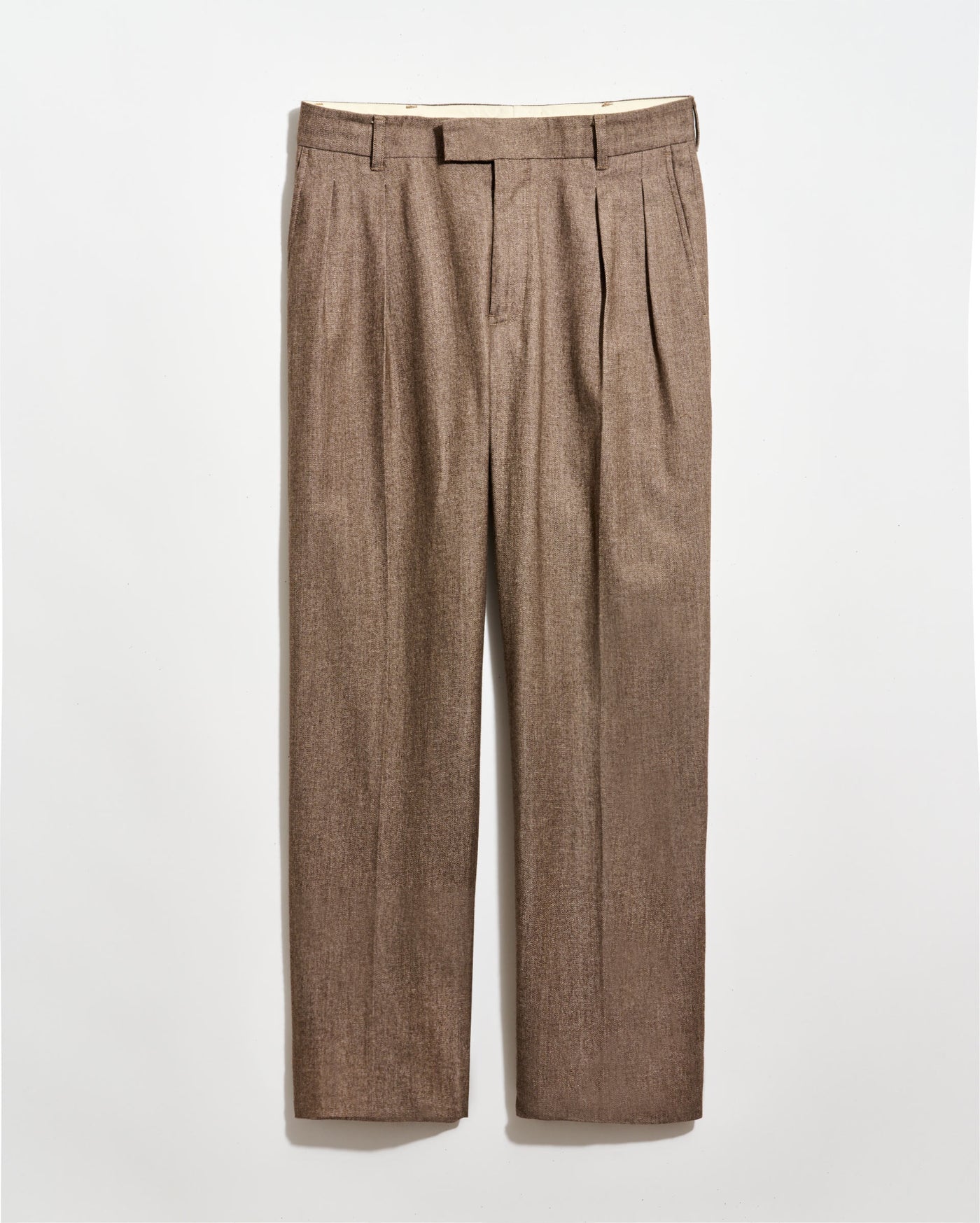 Light brown pleated dress pants with belt loops, front zipper, and straight legs, displayed against a plain white background.