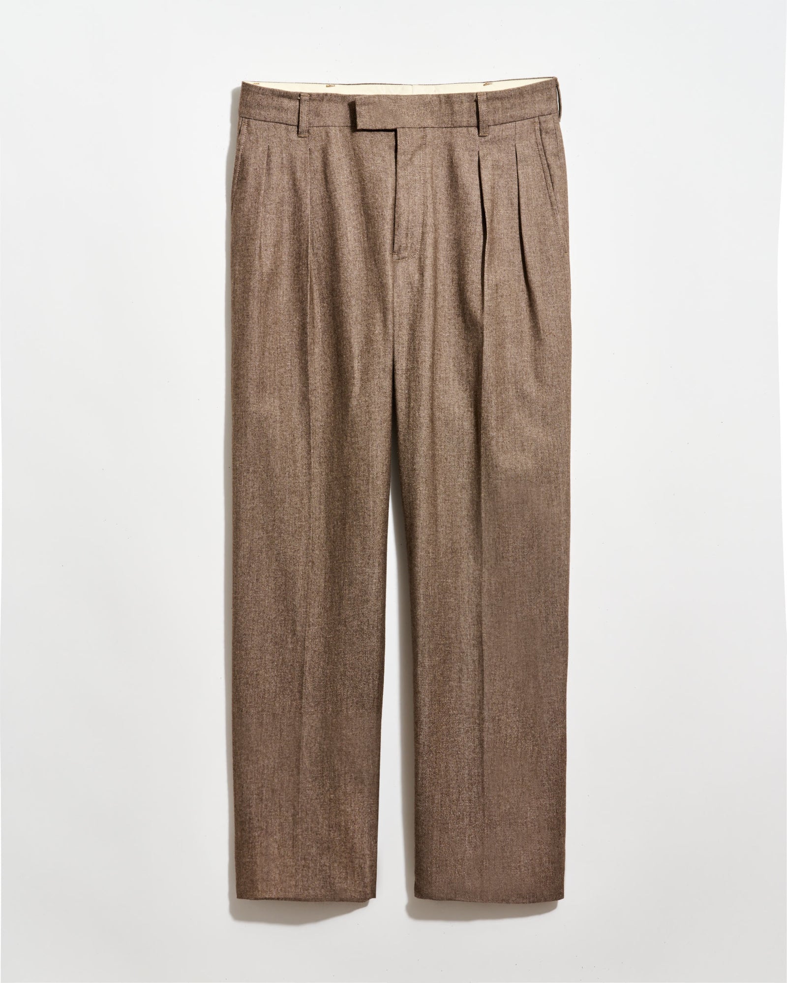 Light brown pleated dress pants with belt loops, front zipper, and straight legs, displayed against a plain white background.