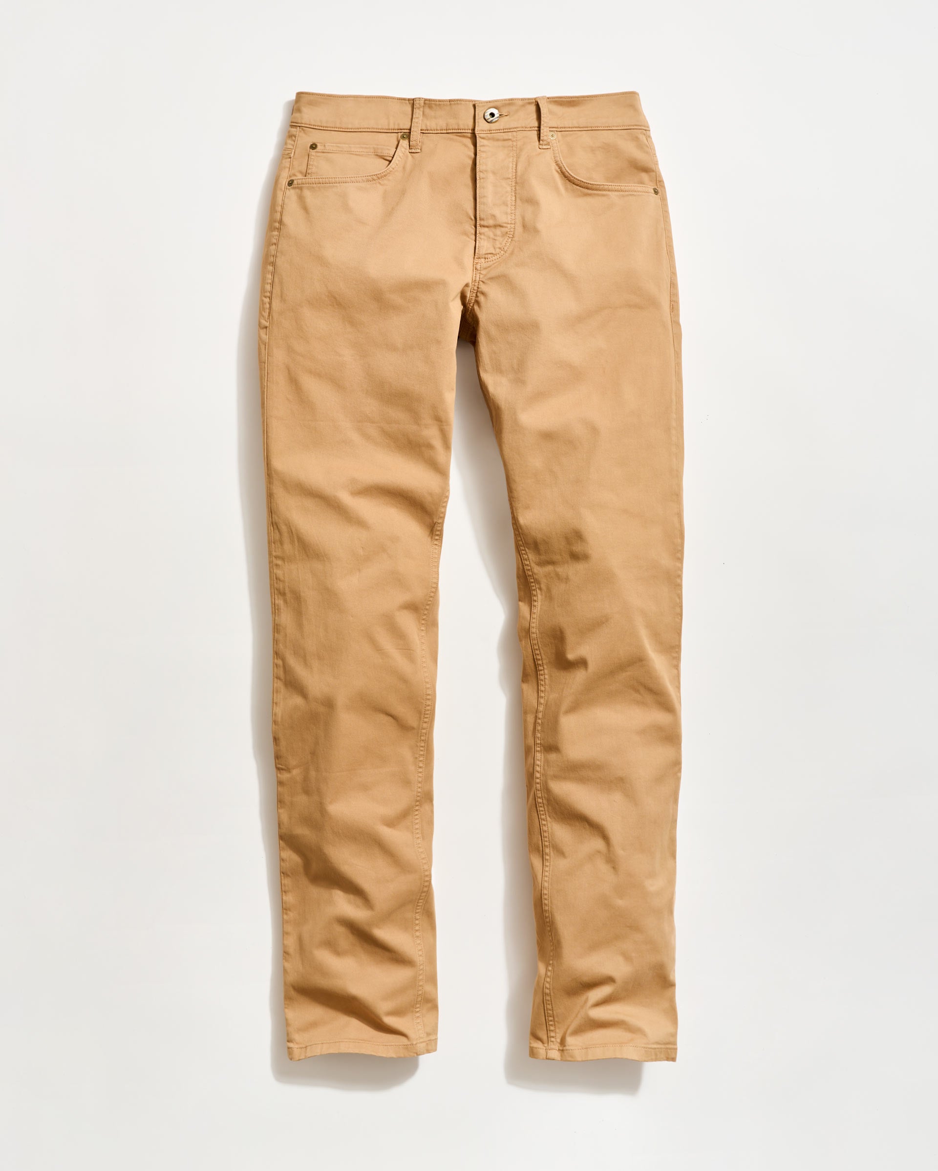 A pair of tan-colored, straight-leg pants made of cotton, displayed flat on a white background. The pants have front and back pockets, belt loops, and a button closure.