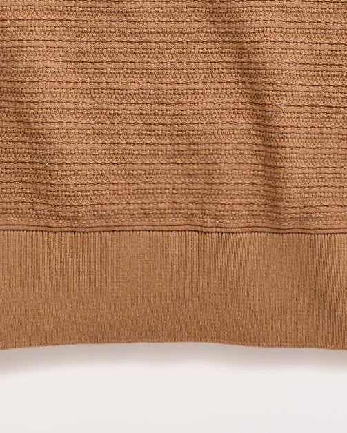 Brown ribbed knit polo shirt on a light gray background