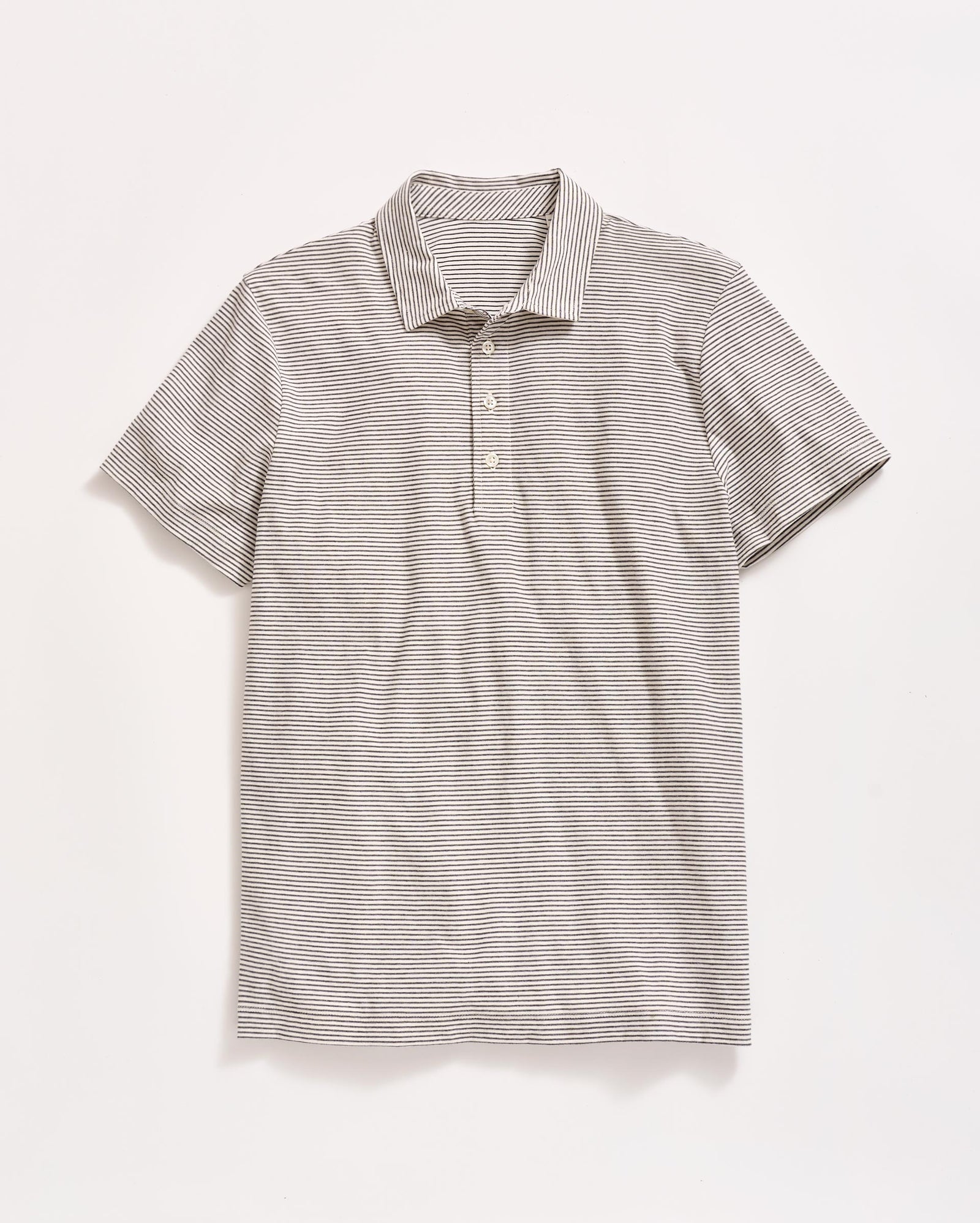 A short-sleeve, light gray polo shirt with thin, horizontal black stripes, a collar, and three buttons down the front, laid flat on a white background.