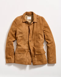 A light brown, long-sleeve jacket with a collar, button front, and two large front pockets, laid flat on a white background. The jacket has a tailored fit and a subtle textured pattern.