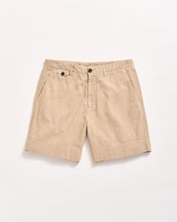 A pair of beige linen shorts with side pockets, belt loops, and a front button and zipper closure, displayed flat on a white background.