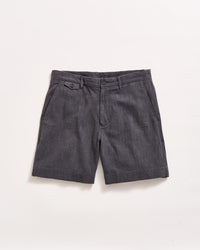Dark gray tailored shorts with front pockets, belt loops, and button details, laid flat on a white background.