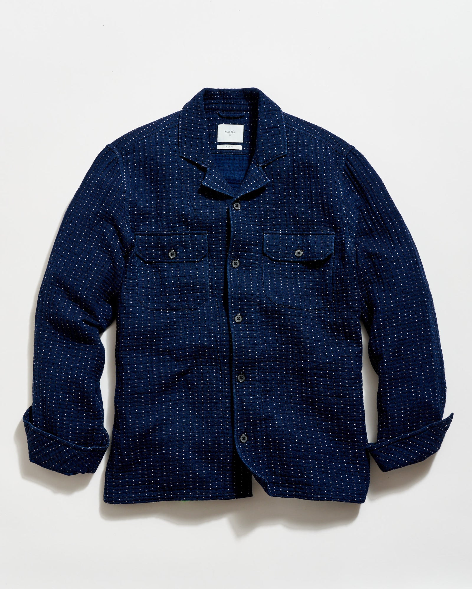 Blue checkered shirt on a light gray background