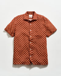 Short-sleeve shirt with geometric pattern on a white background