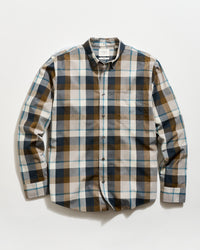 Plaid shirt with brown, blue, and beige pattern on a white background