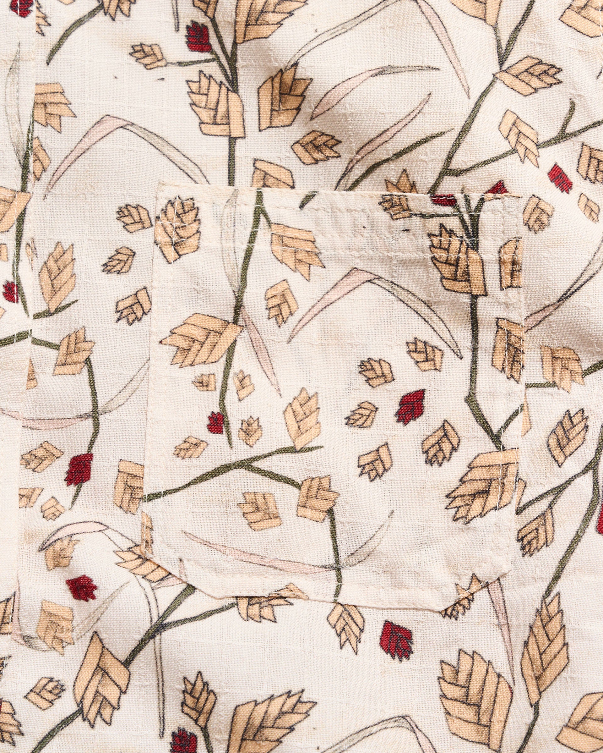 Textile with leaf pattern on a beige background
