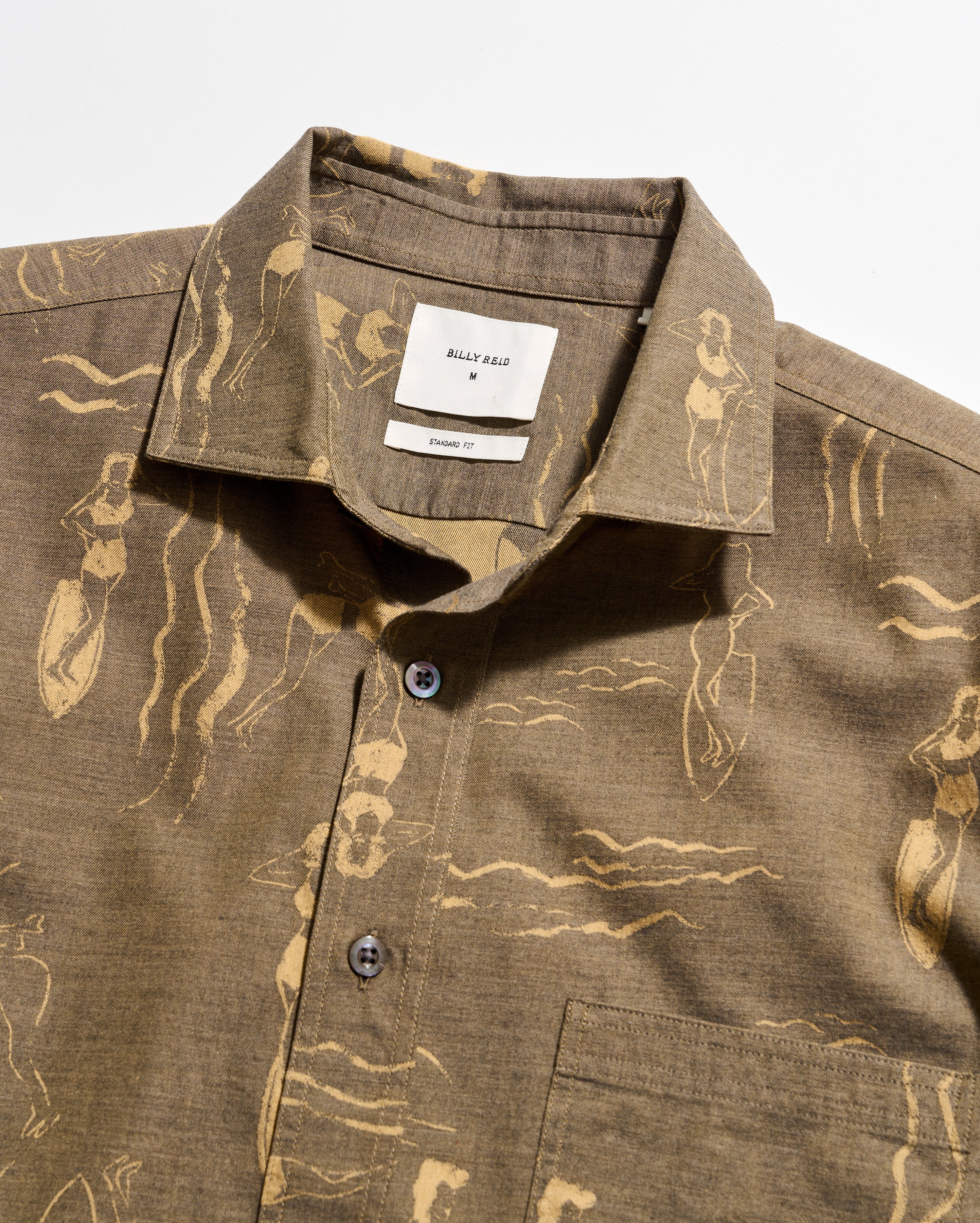 Brown shirt with abstract patterns on a white background