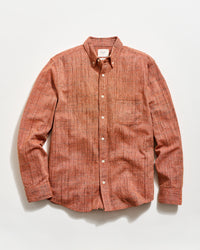 Brown checkered shirt on a white background