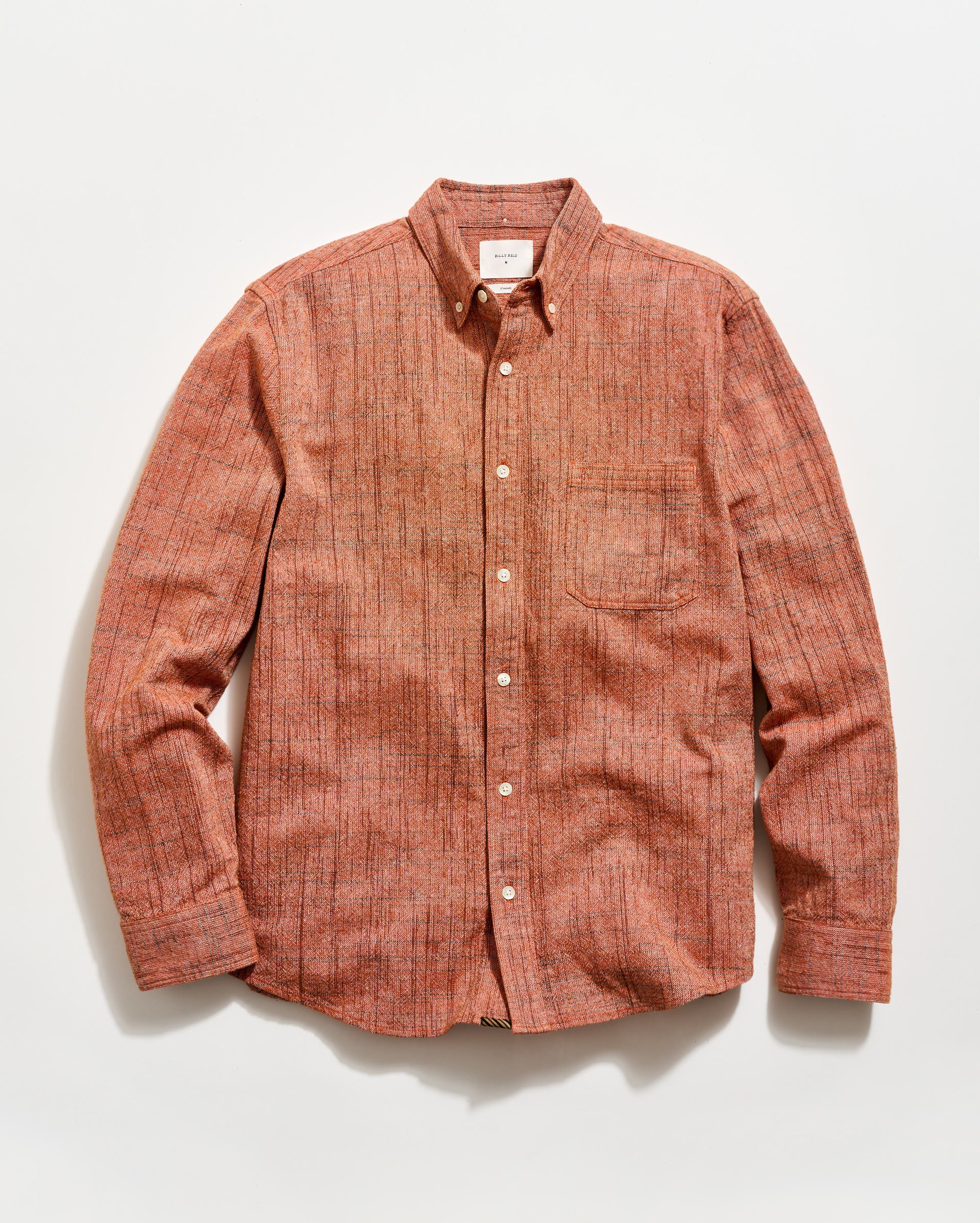 Brown checkered shirt on a white background