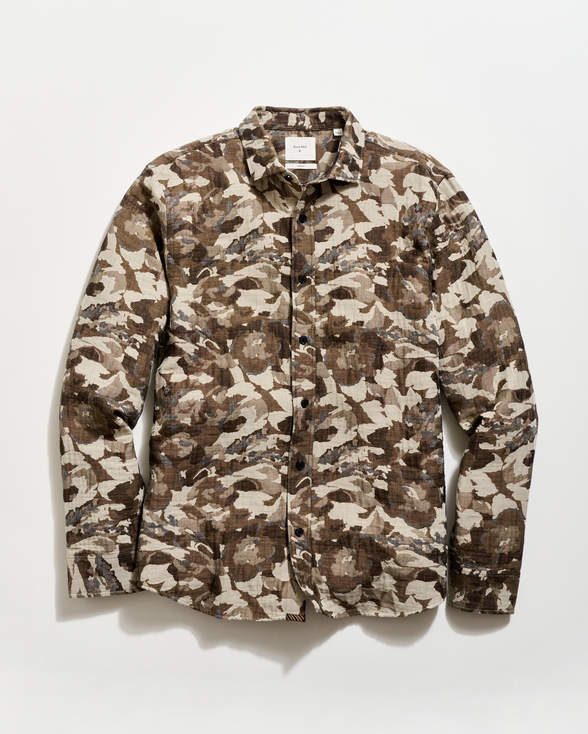 Camouflage-patterned shirt on a white background