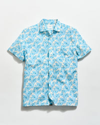 Blue and white patterned shirt on a light gray background
