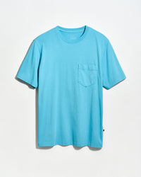 Blue t-shirt with a pocket on a light gray background