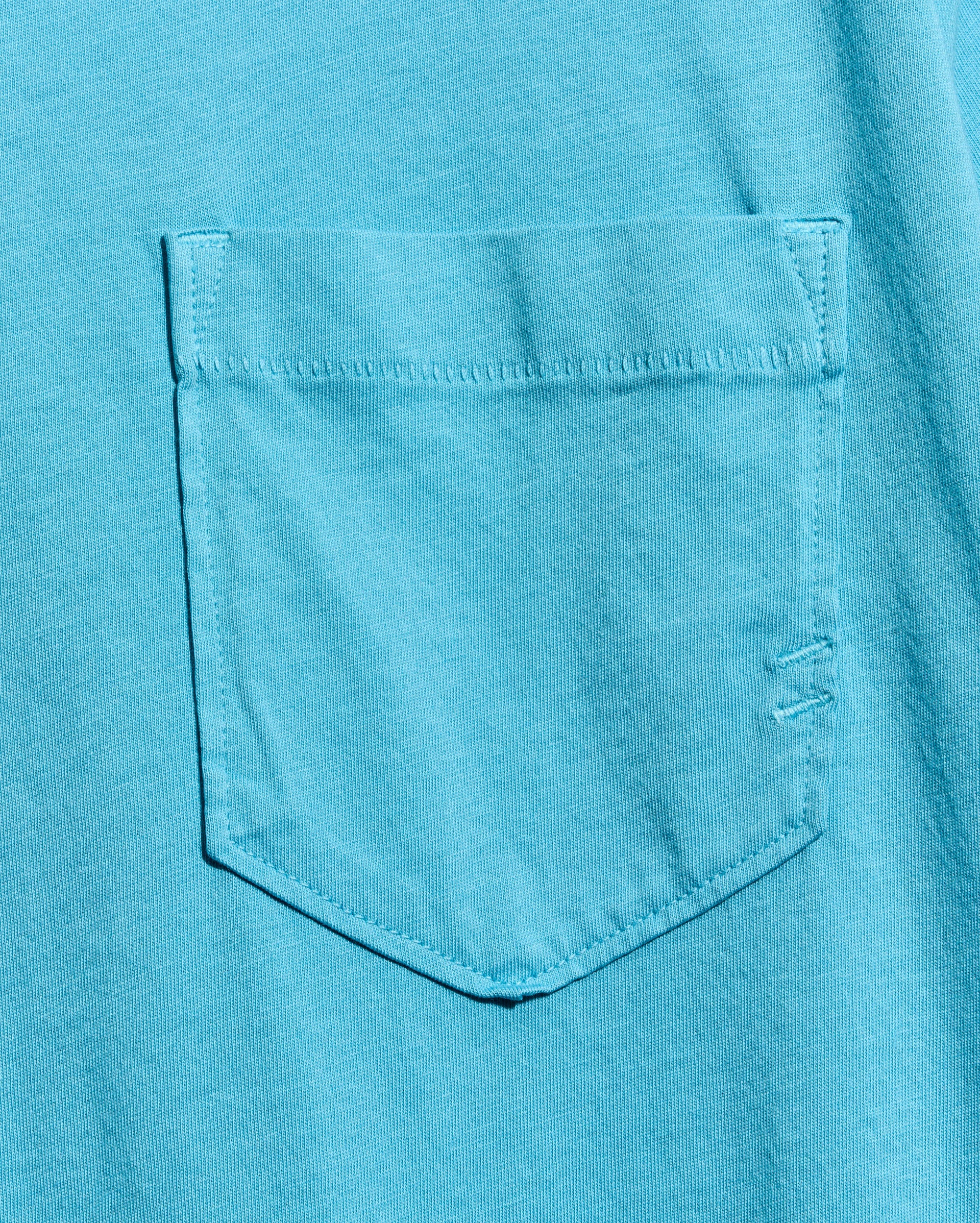 Close-up of a blue pocket on a shirt
