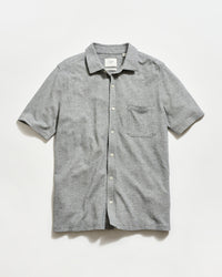 Gray striped short-sleeve shirt on a light gray background