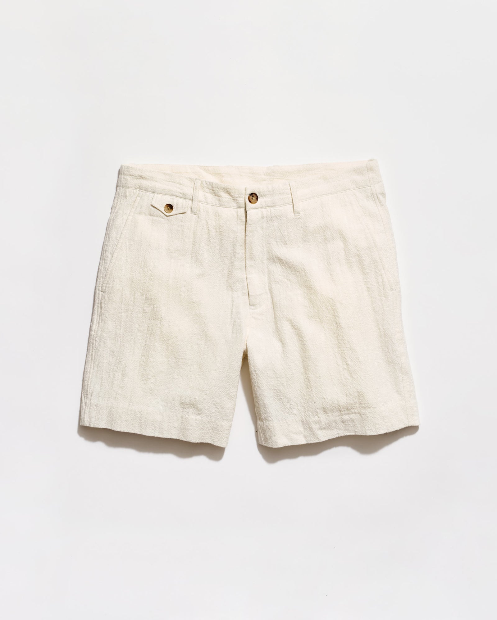 Beige shorts on a white background