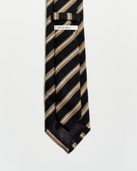 Black and beige striped tie with a 'BILLY Reid' label on a white background