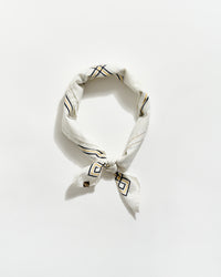 White bandana with black geometric patterns on a white background