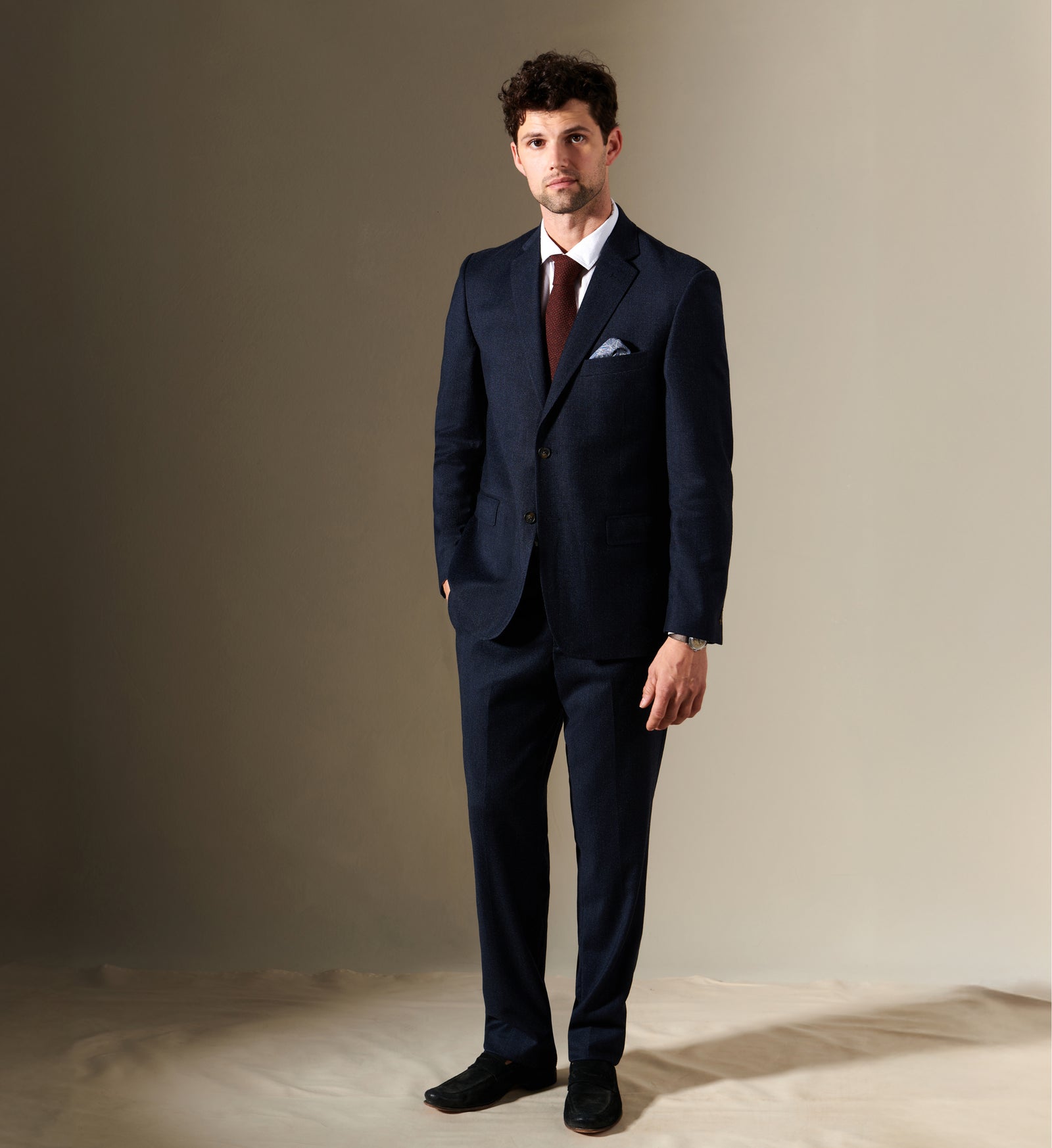 Model wears a custom suit